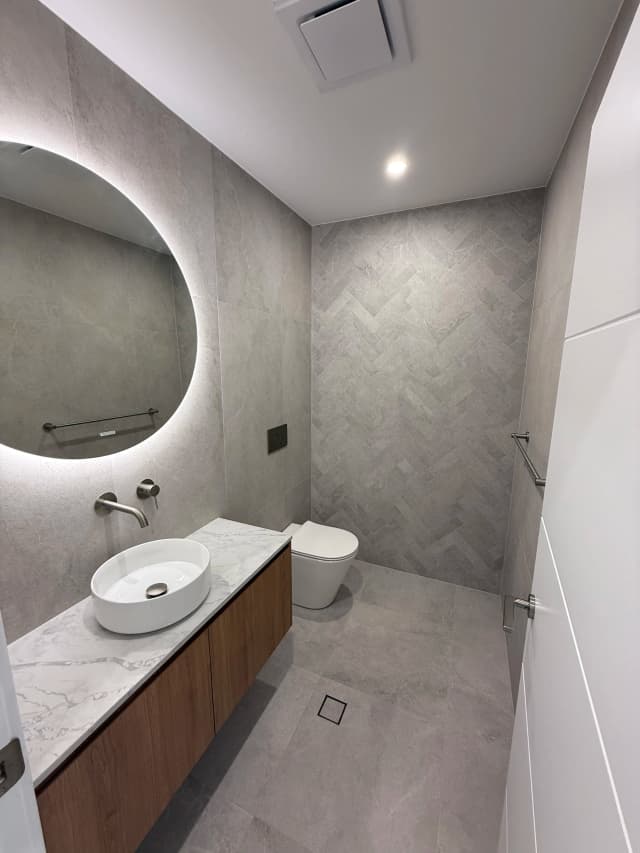 Designer bathroom with hidden storage