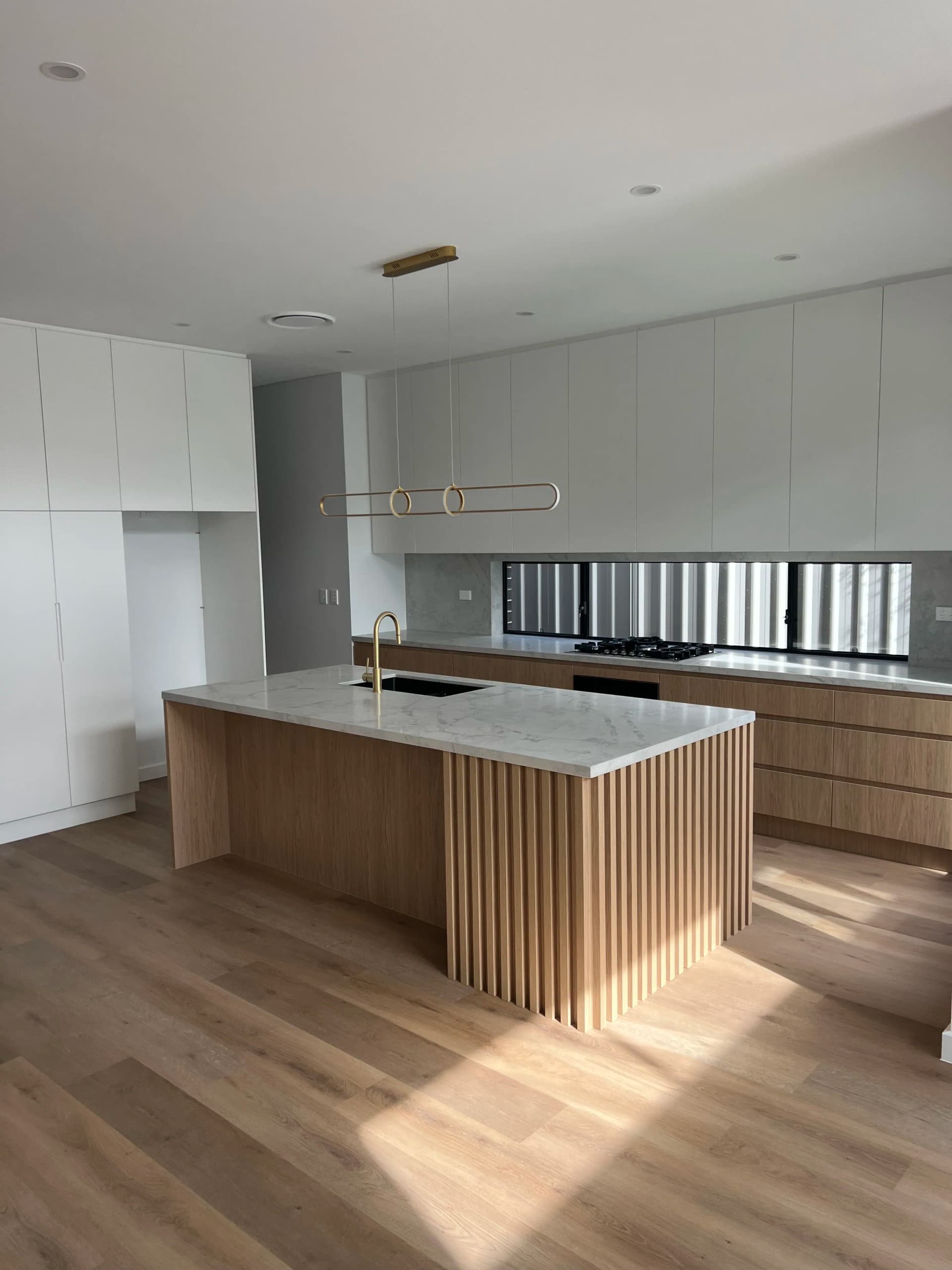 Kitchen with gold fixtures